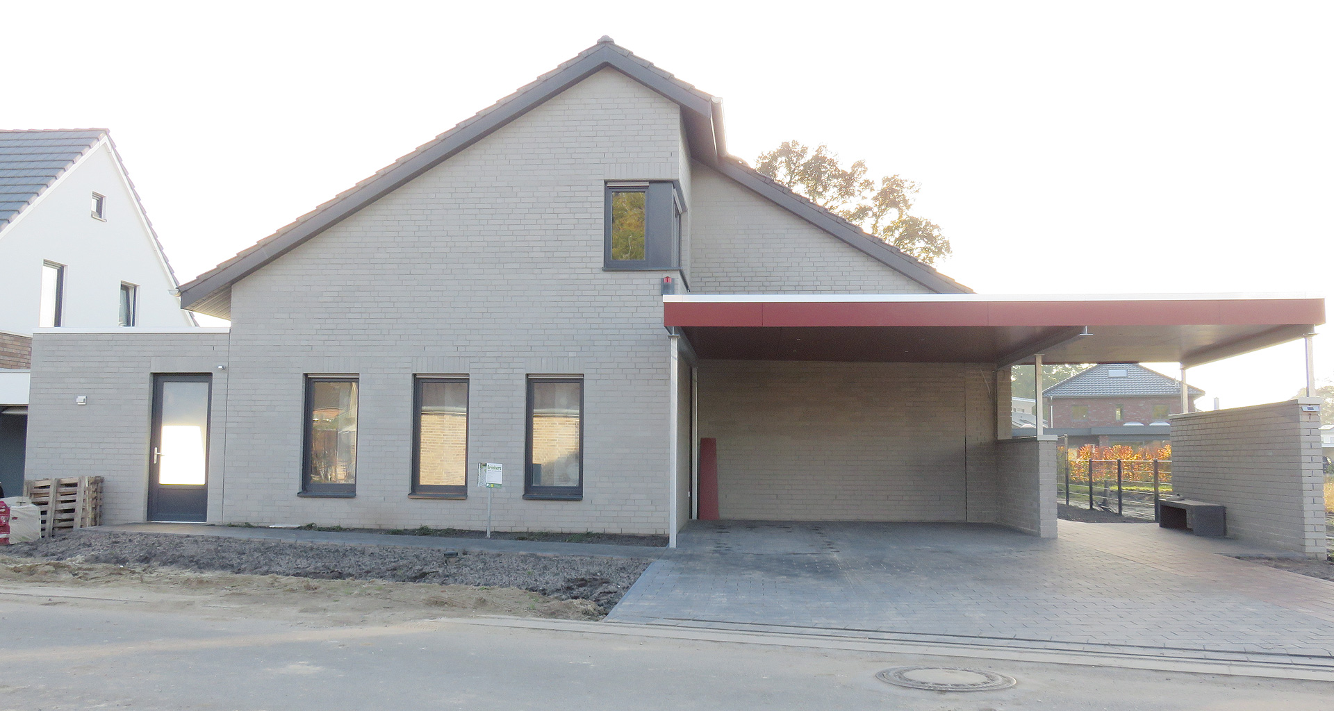 Doppelhaus Front mit Carport und Starße in Nordhorn Grafschaft Bentheim