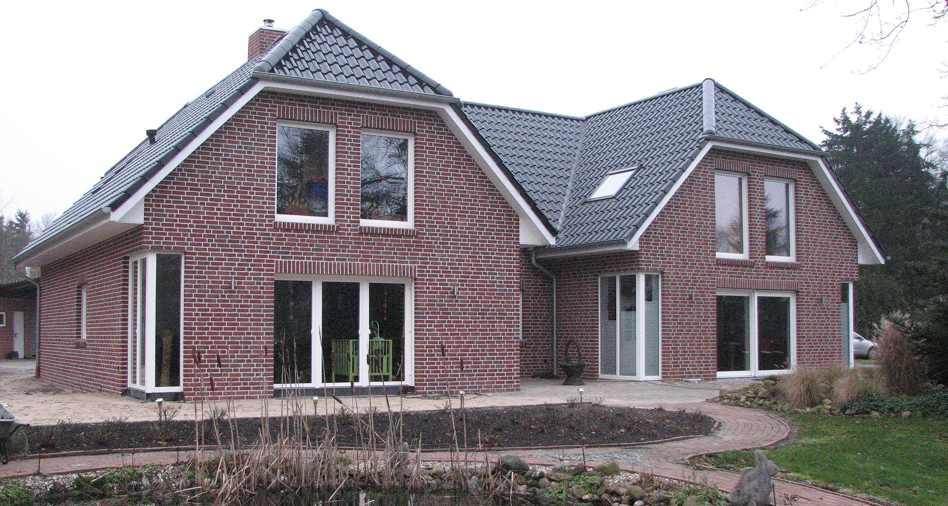Zweifamilienhaus Rückseite mit Terasse Haus links in Twist Emsland