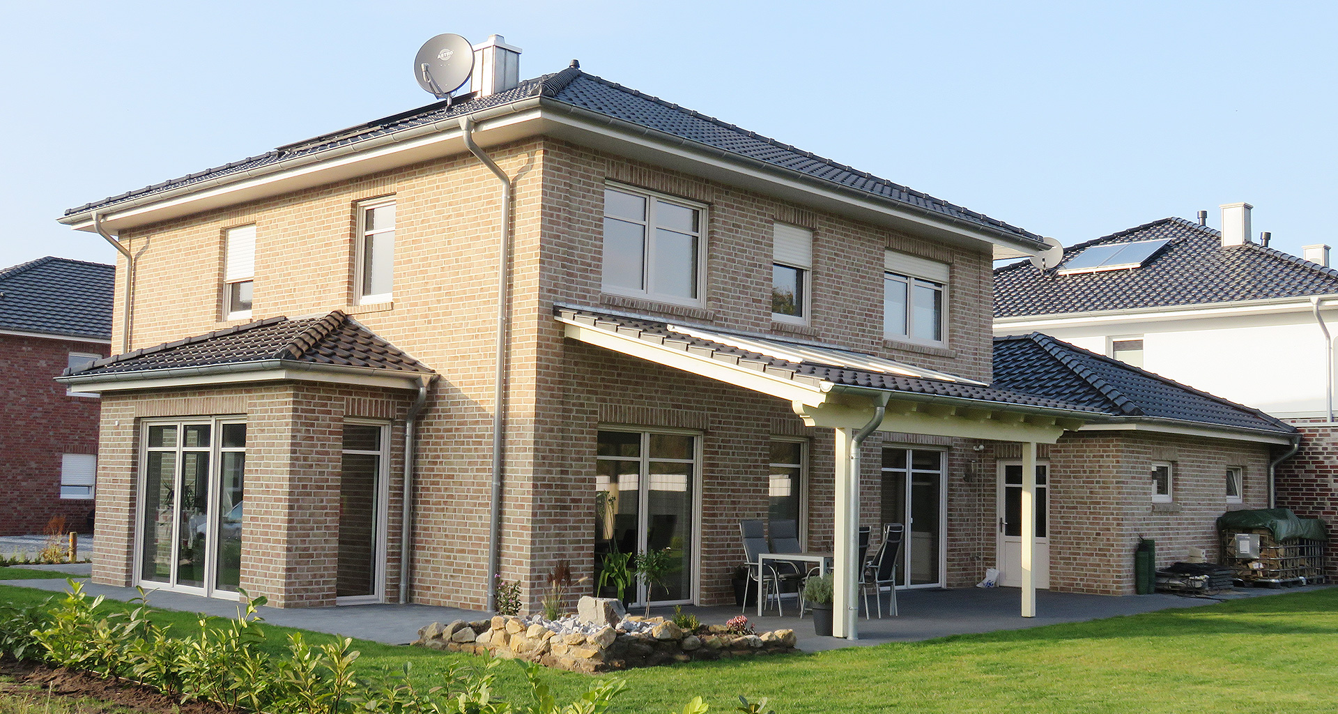 Einfamilienhaus Rückseite mit Terasse in Wietmarschen-Lohne Emsland 2015