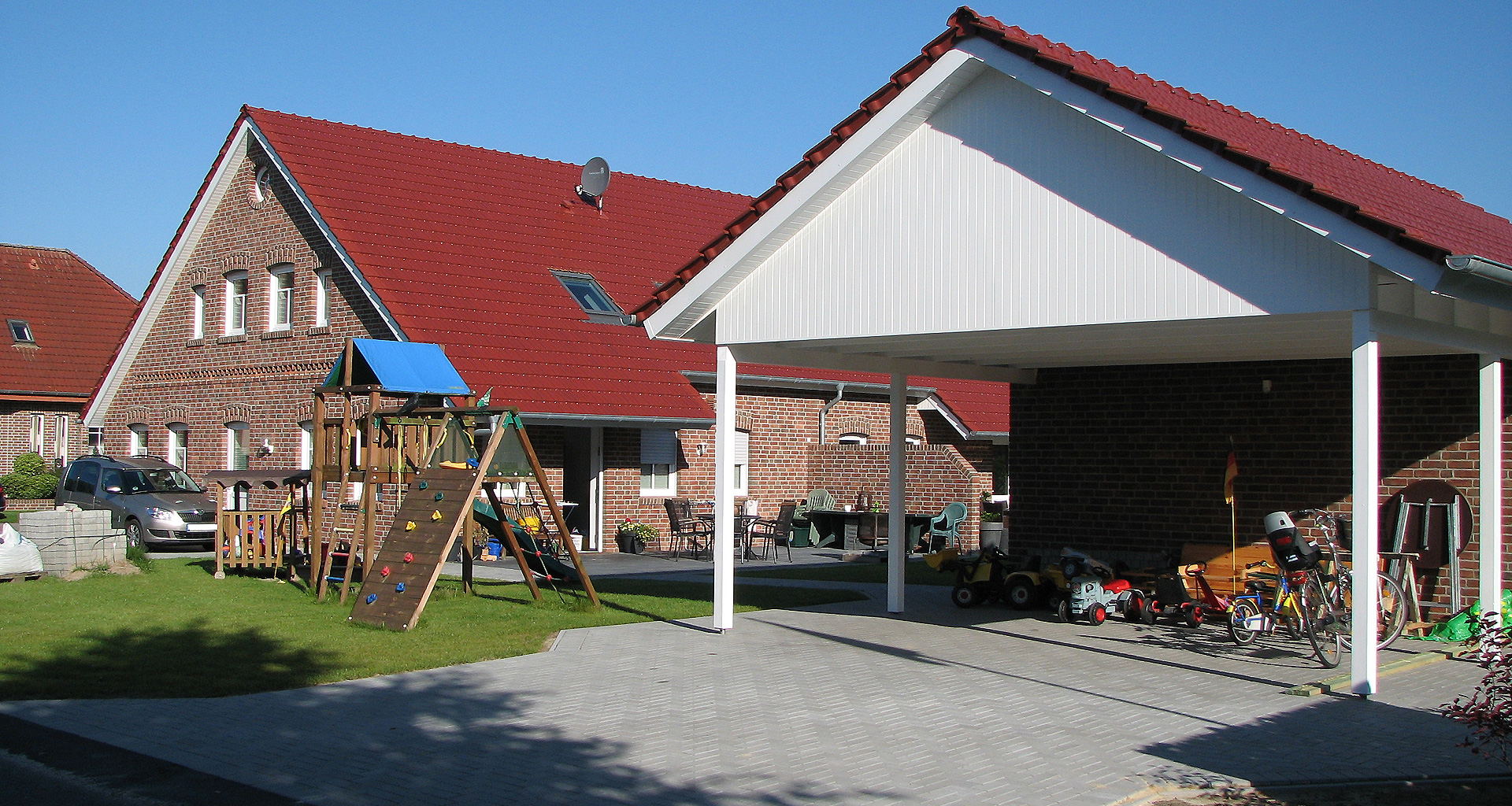 Einliegerwohnung Gros-Hesepe rechte Rückseite mit zusätzlichem Carport